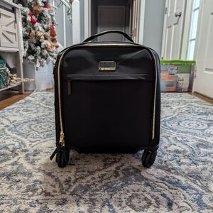 Tumi carry on suitcase